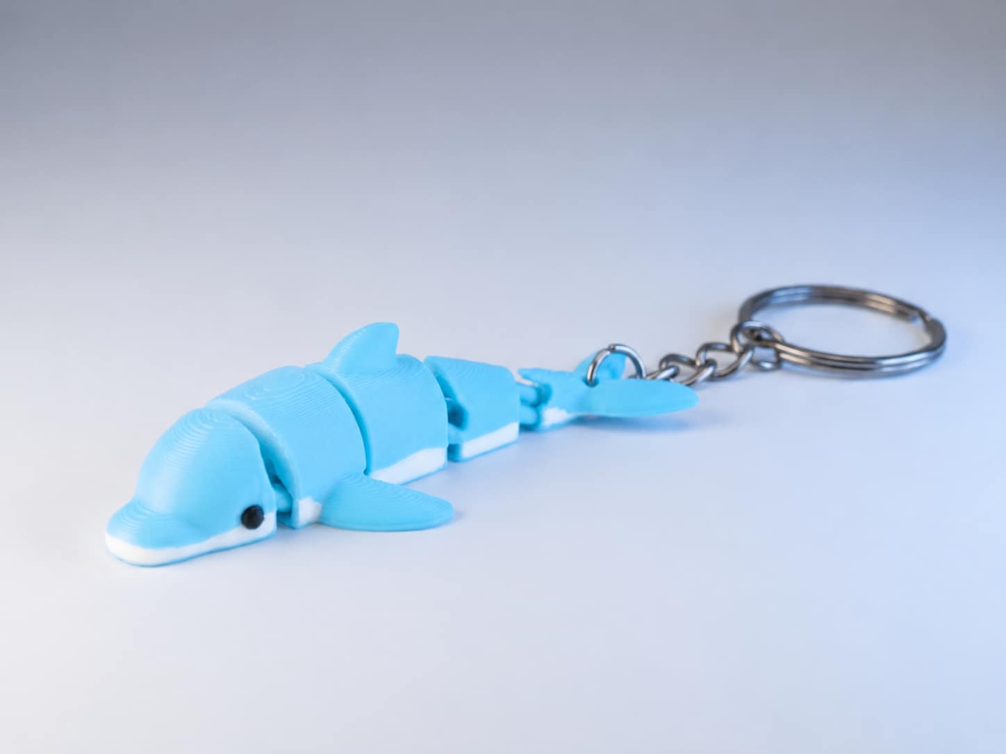 Flexi delfin kulcstartó